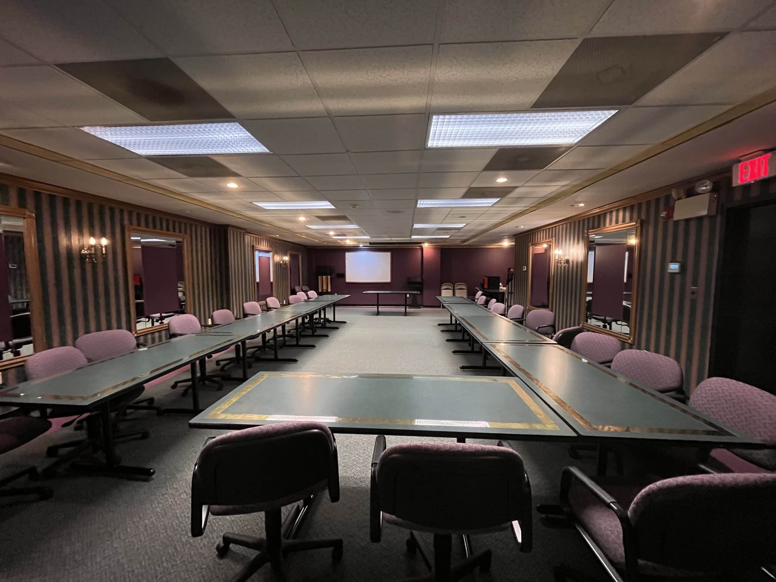 Large conference center with tables set for meetings at Regency Executive Offices in Lancaster